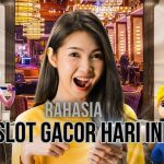 Seorang pemain sedang melakukan analisis data untuk menemukan info slot gacor hari ini di layar tabletnya yang menampilkan grafik permainan.